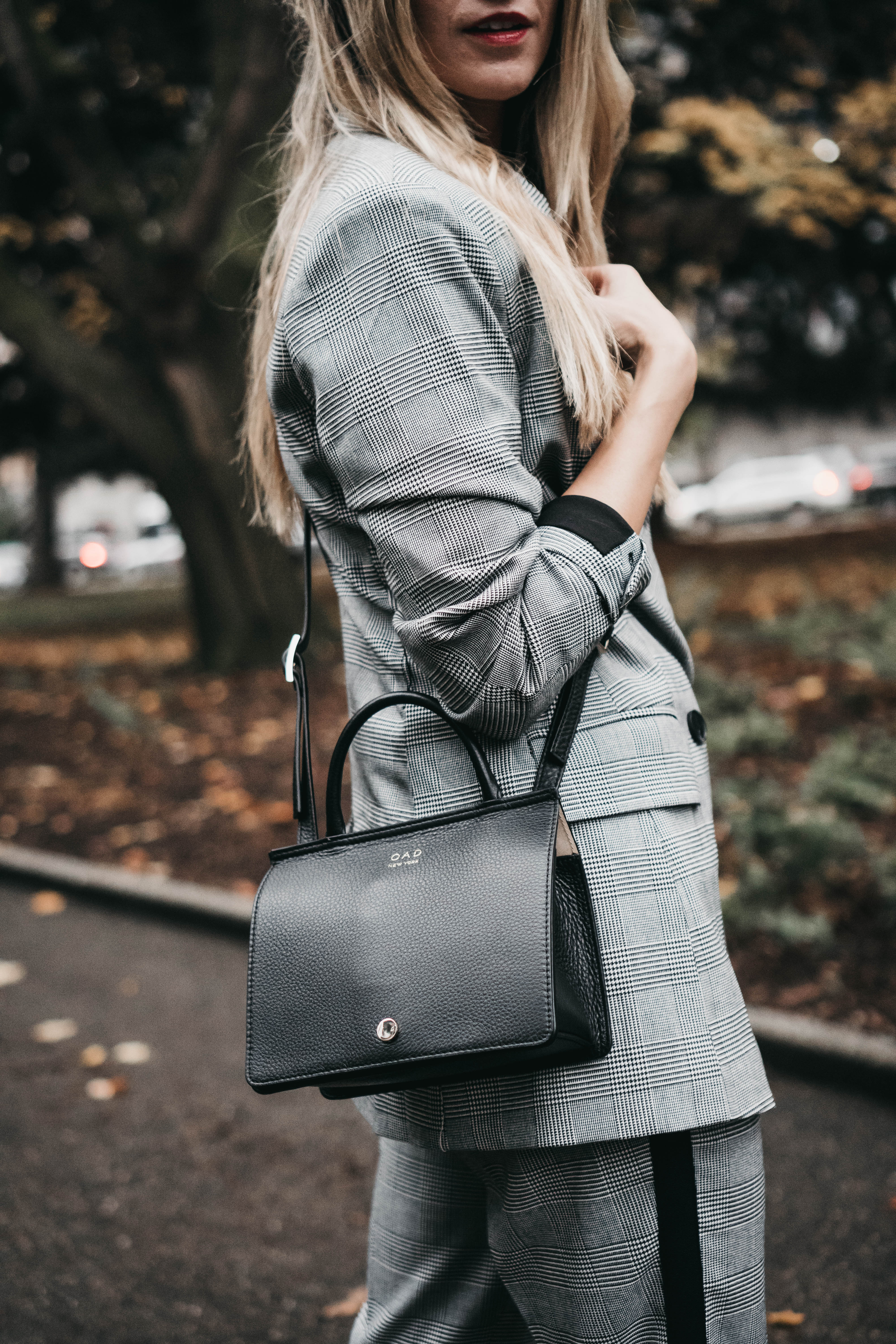 Seattle Blogger Cortney Bigelow of The Grey Edit - OAD New York Mini Prism Crossbody Black - Rachel Roy Plaid Pantsuit - Fall Downtown Scenes