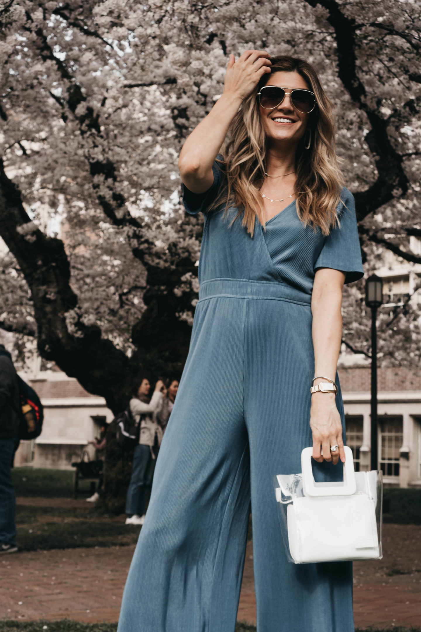 Seattle Blogger Cortney Bigelow of The Grey Edit - Spring Style - UW Quad - Cherry Blossoms - Blue Jumpsuit - Linen Jacket - Outfit