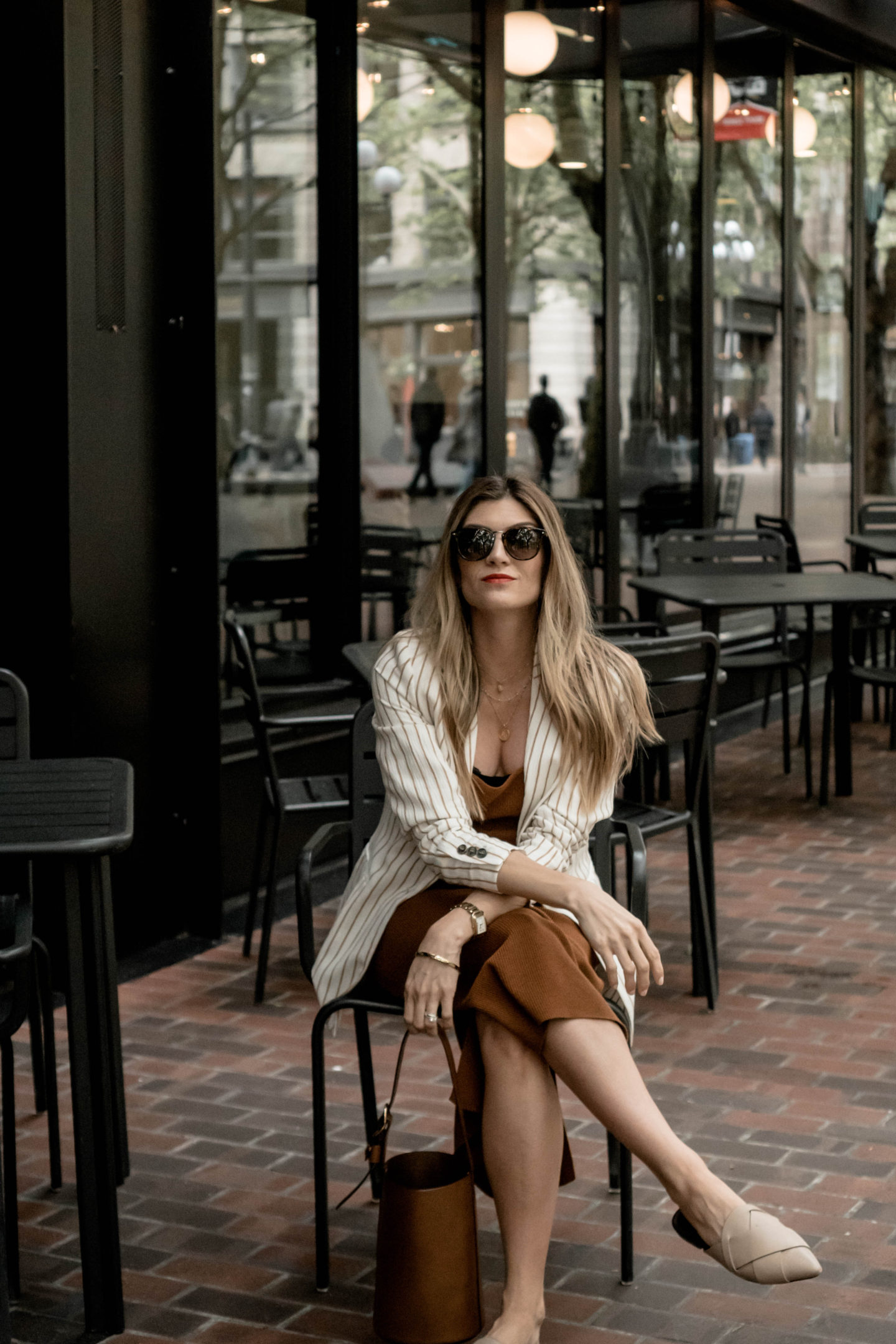 Seattle Style Blogger Cortney Bigelow of The Grey Edit - Styling an H&M Conscious Knit Midi Dress, Striped Linen Blazer, Leather Trademark Bucket Bag + Mercedes Castillo Mules. Sharing her plans around No Buy June + July.