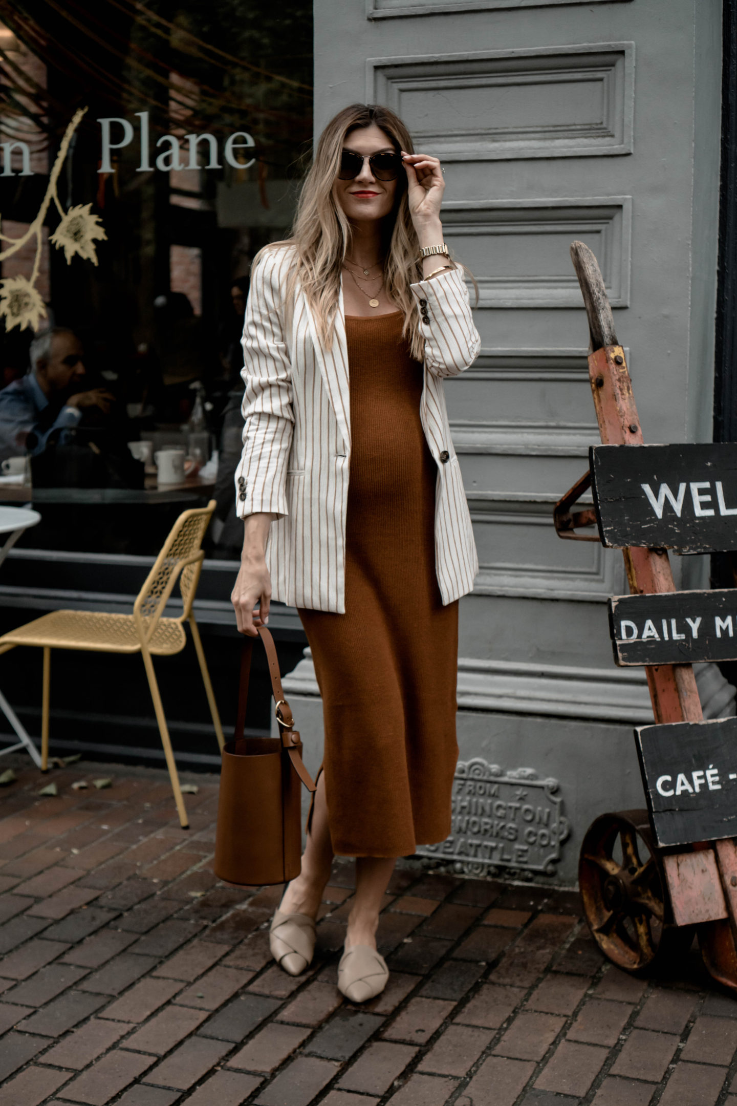 Seattle Style Blogger Cortney Bigelow of The Grey Edit - Styling an H&M Conscious Knit Midi Dress, Striped Linen Blazer, Leather Trademark Bucket Bag + Mercedes Castillo Mules. Sharing her plans around No Buy June + July.