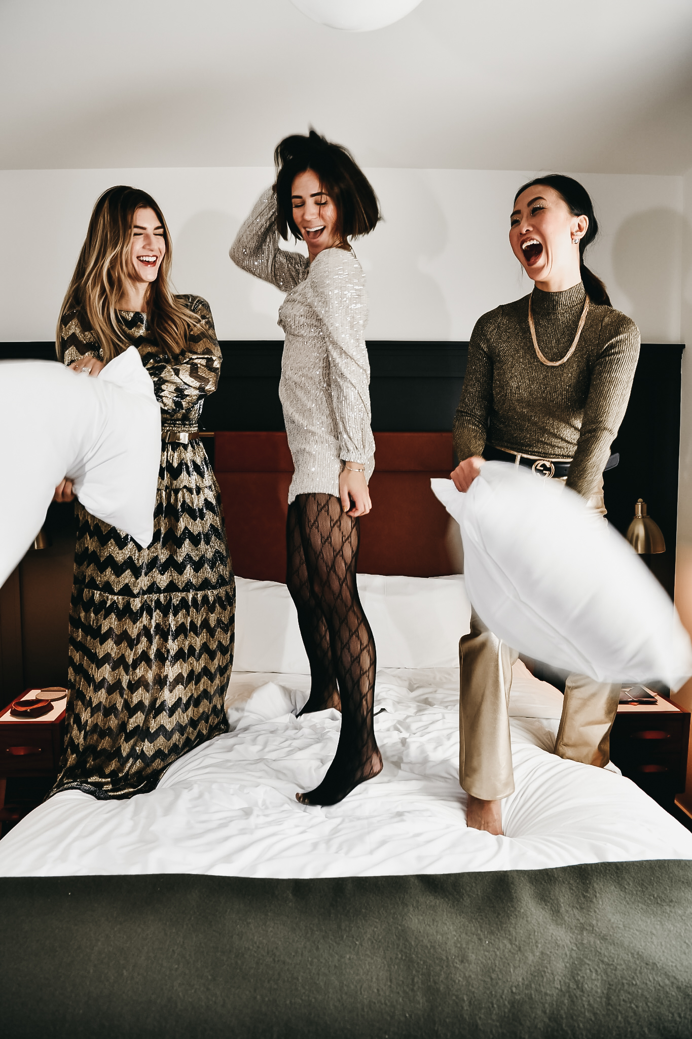 The Grey Edit - Seattle Bloggers - Stylelogue - December Holiday Tinsel - Metallic Dressing - The State Hotel - Jumping on bed